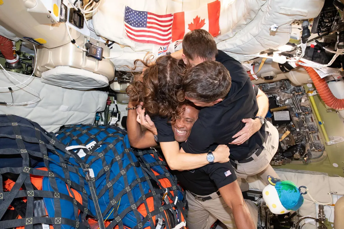 Crew celebration aboard Orion after flyby